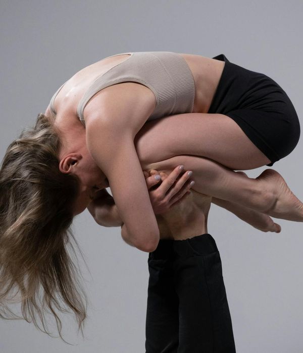 Dynamic yoga pose showing flowing movement and strength.